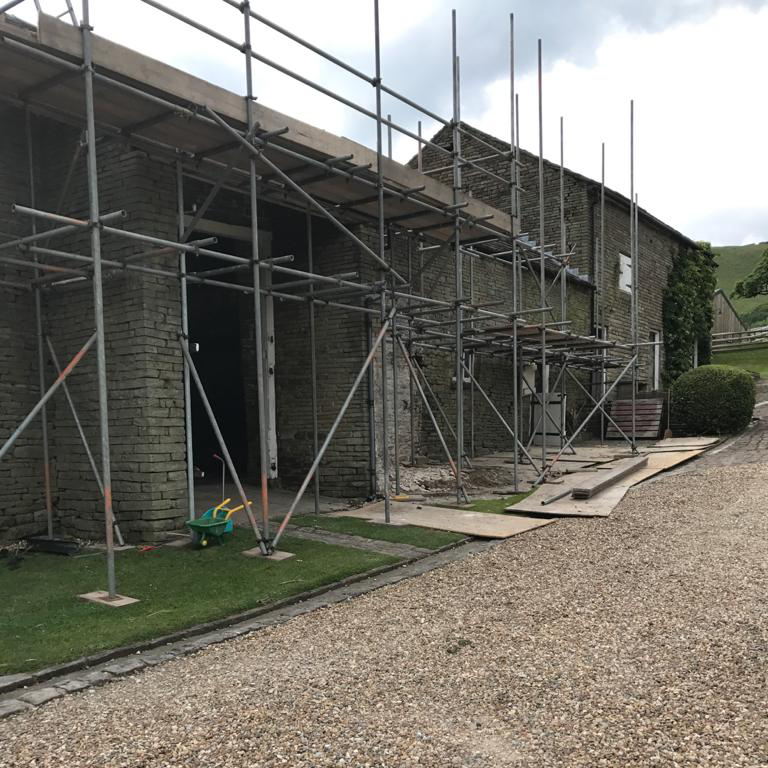 Scaffolding on the barn conversion and cottages at Harrop Farm